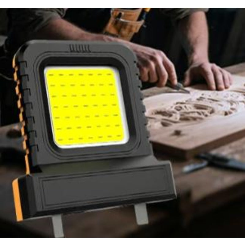 Portable work light for all power tool batteries